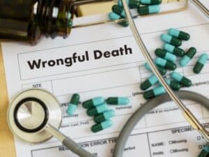 Depending on the circumstances of and damages resulting from a wrongful death, victims may be able to recover large settlements in a wrongful death claim or lawsuit. Knowing more about how these cases work and the elements of the law they involve can help determine exactly how much a wrongful death lawsuit is worth. Who Can File a Wrongful Death Lawsuit? Before considering filing a wrongful death lawsuit, you might wonder who is entitled to wrongful death benefits. If a loved one dies as the result of another party's negligence or malicious intent, the victim's family may file a wrongful death lawsuit against the liable party. Specifically, immediate family members may be able to recover compensation through a suit, which could include the spouses, children, partners, or parents of the deceased. If these family members are unable to file a suit on the victim's behalf, other dependents may also file. How Much Can You Expect to Recover in a Wrongful Death Lawsuit? If you're asking how much a wrongful death lawsuit is worth, keep in mind that every lawsuit differs in the total settlement amount due to numerous contributing factors. There isn't a universal average settlement in these cases, and they can range anywhere from thousands to millions of dollars, depending on the circumstances and the specific damages involved. A wrongful death settlement calculator may help give you a rough estimated settlement, but many factors will influence the total amount. Knowing more about the different elements of a wrongful death case and what to expect during the legal process will help you more accurately determine how much a case is worth. Types of Damages for a Wrongful Death Case The loved ones of wrongful death victims may recover a wrongful death lawsuit settlement consisting of compensation for a range of damages.  Specific damages in wrongful death cases could include economic, non-economic, and, in rare instances, punitive damages. Knowing how each of these types of compensation work will help you incorporate them into a wrongful death lawsuit settlement. Economic Damages The first type of damage to consider is economic, which refers to the various financial losses resulting from a loved one's death.  Examples of economic damages in wrongful death cases include: Medical expenses for treatment leading up to the victim's death Loss of income Loss of future earnings Costs pertaining to the victim's death, including funeral and burial expenses Non-Economic Damages In addition to economic damages, victims' loved ones may recover non-economic damages. These account for the experience of the victim and loved ones following an accident and death.  Non-economic damages in wrongful death lawsuits may include the pain and suffering the victim and loved ones experience, along with loved ones' psychological anguish and trauma resulting from the wrongful death.  Punitive Damages If the wrongful death resulted from gross negligence or maliciousness on the part of liable parties, the court may award punitive damages to make an example of the defendant. Unlike compensatory economic and non-economic damages, the court will award these specifically to punish defendants and prevent similar behavior in the future. Factors That Can Affect the Value of a Wrongful Death Settlement When calculating the total amount of a wrongful death settlement, multiple factors will influence the calculation. These factors include: The Damages Sustained One of the biggest factors that influence wrongful death settlements is the total amount and types of damages that result from an accident. Some fatal accidents result in more damages that may warrant larger settlements. For example, the death of someone who's built a family and a career with a spouse and multiple children will likely cause greater hardship for loved ones than someone who doesn't have a family and is unemployed at the time of death. The individual with a career and family would leave dependents to suffer from lost income, services, and emotional support, warranting a larger amount of compensation. Individual family members may also be able to file separate wrongful death claims based on their relationship with the victim. The Insurance Policy Limits Available to Cover the Claim Another factor that will influence a wrongful death lawsuit settlement is the amount of insurance coverage that the defendant has to cover the damages. Often, plaintiffs in these cases seek compensation that doesn't exceed the limit of the defendant's insurance policy.  Even if a case is actually worth significantly more than the defendant's policy limit, a plaintiff may be forced to seek the amount on the policy. For example, you might have a case that's worth $250,000, but the defendant's policy limit covers $100,000. In this instance, you may be able to take the case to court to recover the remaining $150,000 from the defendant, but it's less likely you'll be able to recover the full amount if the defendant is unable to pay it using his or her own assets. The Degree of Liability The degree to which the defendant is liable in a wrongful death will also influence the final settlement amount. In some cases, defendants may be solely liable for an accident and a wrongful death, requiring them to cover the entire settlement alone. In other cases, the victims or other parties may share fault.  For example, when a hit-and-run becomes wrongful death to a pedestrian, the liable driver would likely be the only responsible party, making it easy to determine liability and pin it on one party. However, in an accident involving multiple drivers, one of which is the victim, and all drivers are partially liable, the case could get more challenging. Plaintiffs in these cases must be able to prove fault, whether one or multiple parties are liable. If you can effectively prove liability, this will increase your chances of successfully reaching a favorable settlement. The Jury's Perception in a Trial Setting If a wrongful death lawsuit goes to trial and involves a jury, the jury will play a big role in determining the results of the case. In a trial, both parties would need to persuade the jury that their argument is correct. The jury may then make a decision based on the witnesses' credibility, the types and impact of evidence in the case, and the sympathy that the jury feels toward either the plaintiff or defendant in the case. How Long Do I Have to File a Wrongful Death Case? One final factor to consider if you want to file a wrongful death lawsuit is the time limit you have to file. Every state has a specific statute of limitations in place for each type of lawsuit, including wrongful death cases. These limitations give you a certain amount of time to file a claim or lawsuit before you're unable to seek compensation. The statute of limitations for wrongful death cases varies from state to state, depending on the legislature in place. For example, in Nevada, the statute of limitations for wrongful death lawsuits is two years from the time of the victim's death or discovery of the person's death.  If you don't file a lawsuit before the statute of limitations passes, you may be entirely unable to file a wrongful death suit. However, exceptions to this statute may apply under certain circumstances. For instance, you may receive an extension on the statute if the case involves medical malpractice, a government entity, or a murder or homicide. An attorney may help you determine if you qualify for an extension based on the specific details of your case. Calculating the Total Settlement Amount for Wrongful Death Wrongful death cases are often complex and involve many factors that can affect the final amount of compensation that victims' loved ones may recover. As a result, it can take a lot of time and energy to calculate the settlement amount.  If you need some help with calculating the total settlement amount in a wrongful death case in or near Las Vegas, you may benefit from consulting with a Las Vegas wrongful death lawyer. An attorney can discuss a potential case in a free consultation and review the facts involved. He or she may then decide to represent you and help you calculate the total amount of compensation you're able to recover. The attorney may proceed to file a claim or lawsuit to begin the legal process. Ultimately, calculating the total settlement amount in a wrongful death case can get complicated. When determining the value of a case, you'll need to consider the damages, liability, jury appeal, and other factors that can directly affect the final settlement. With this total in mind, you may begin building a successful wrongful death case against liable parties responsible for the victim's death and subsequent damages.