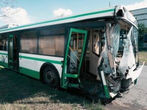 Broken in an accident the bus is in the Parking lot. Public transportation accident concept